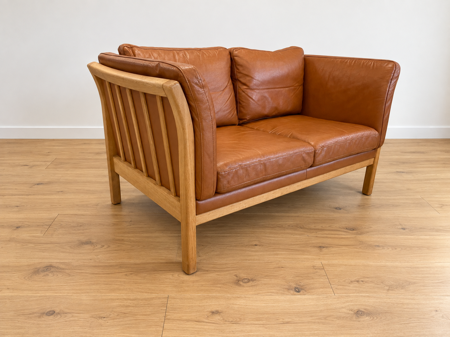 Vintage Danish 2 person sofa in cognac leather with oak frame