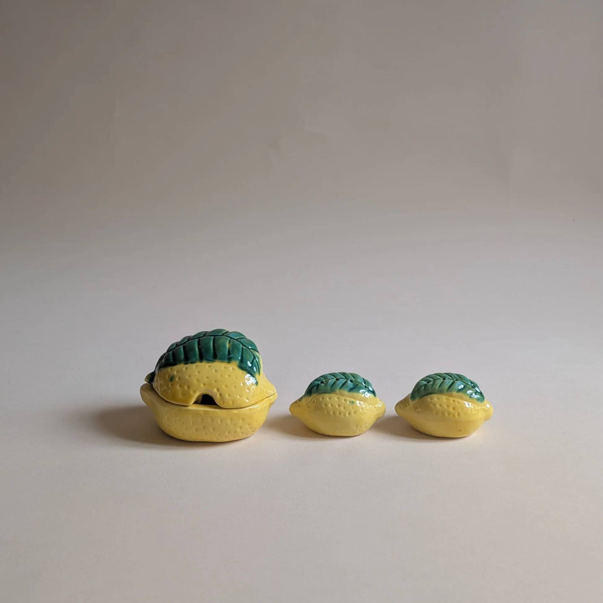 Lemon slushie set, gravy boat, pepper shaker and salt shaker