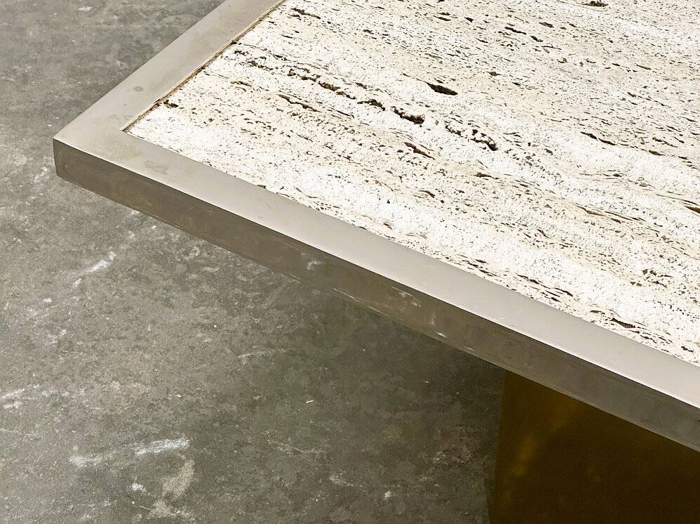 Brute travertine coffee table with brass base and chrome edges, France 1970s.