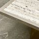 Brute travertine coffee table with brass base and chrome edges, France 1970s.