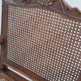 Louis XV Regency cane armchair leather armrests decorated with shell