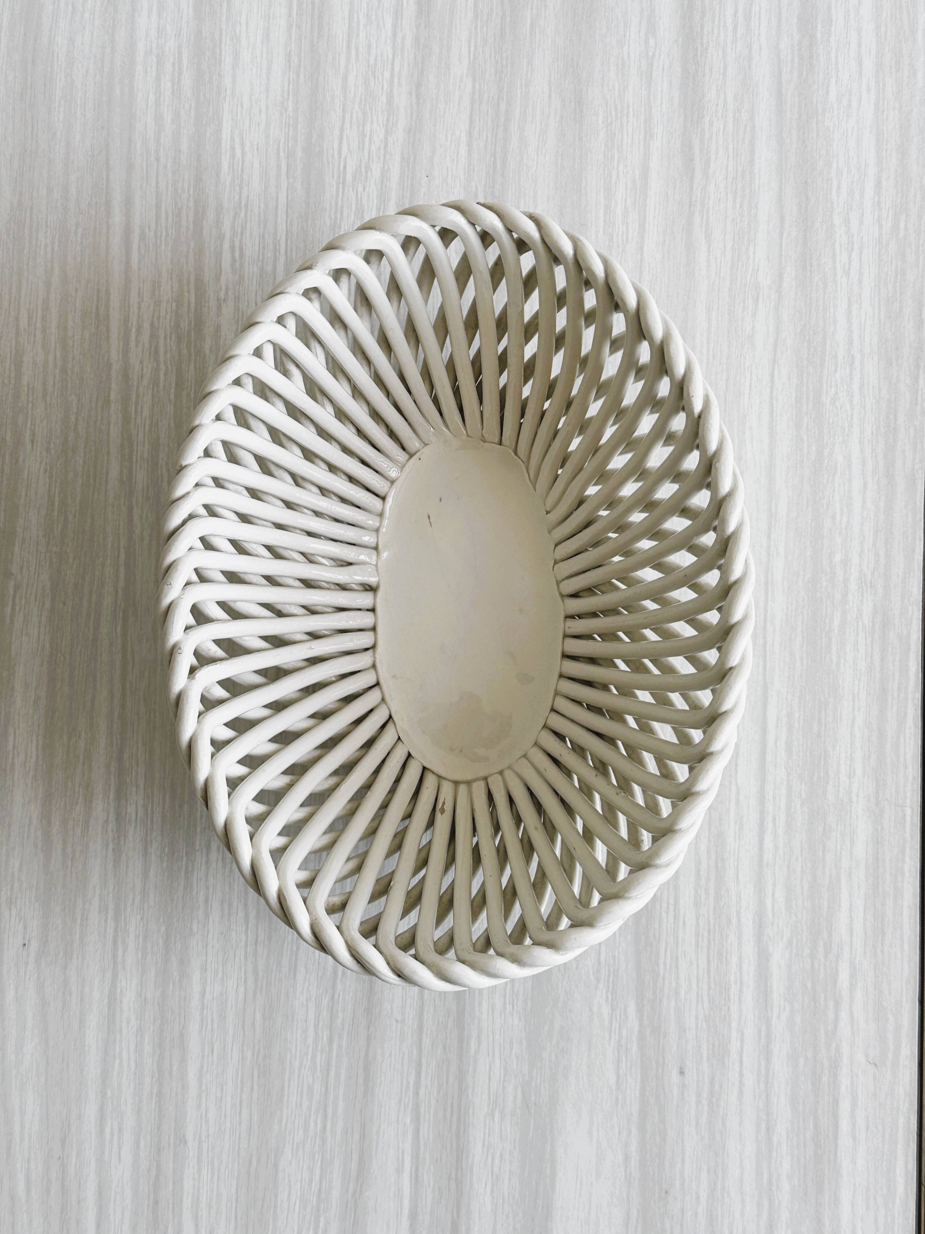 Small white ceramic twisted basket