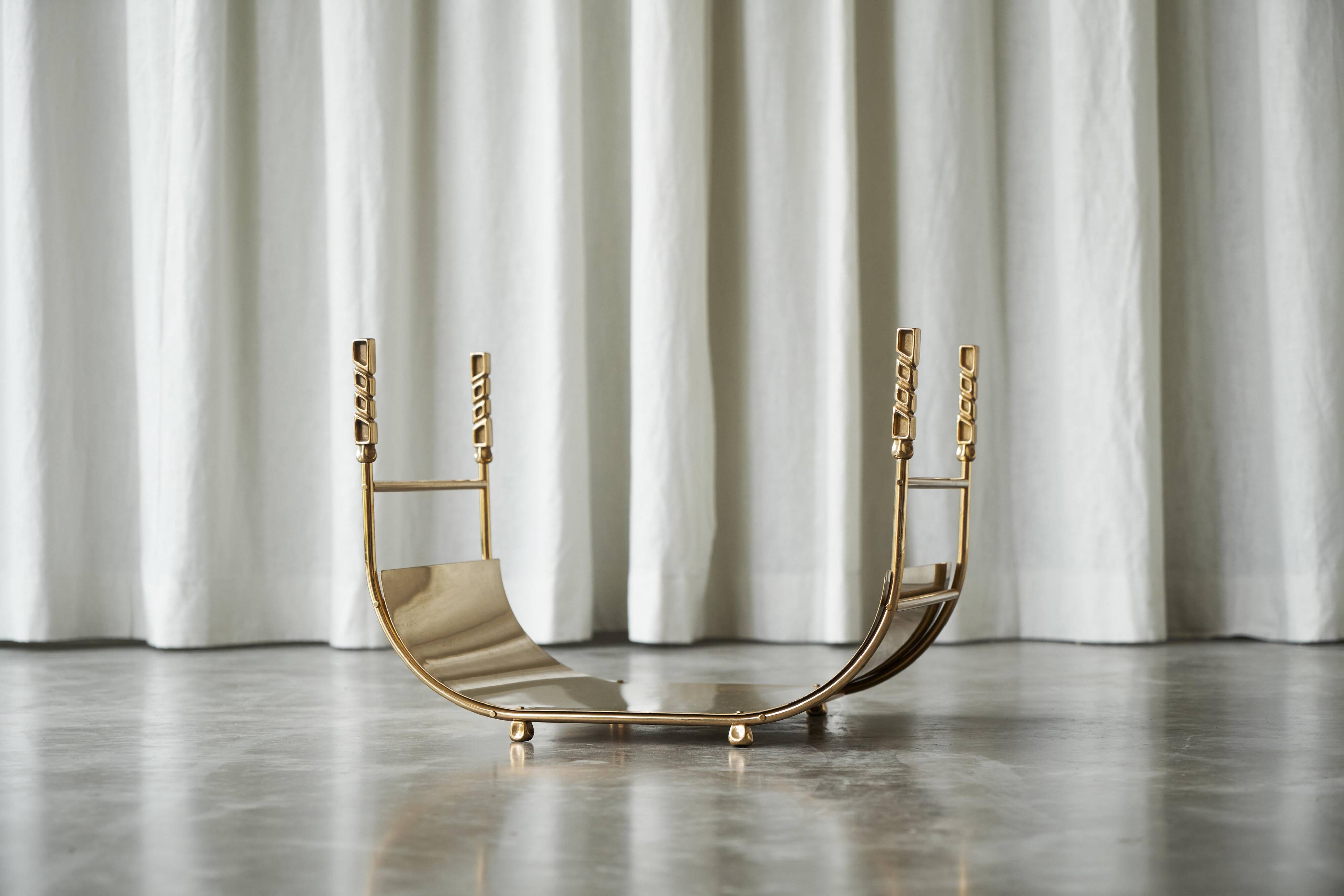 Sculptural brass magazine rack or basket from the 1970s.
