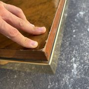 Table basse loupe d'orme et laiton 70' Roche Bobois