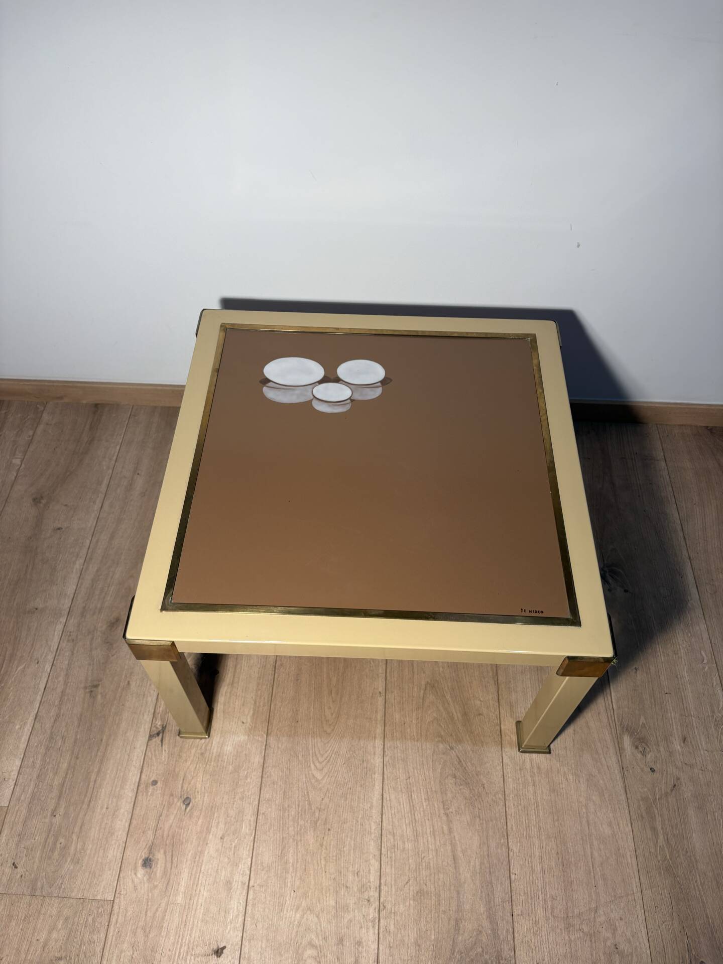 Metal and brass coffee table in ceramic by Nisco.