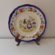Plate of Breton earthenware of regional art KG France Quimper