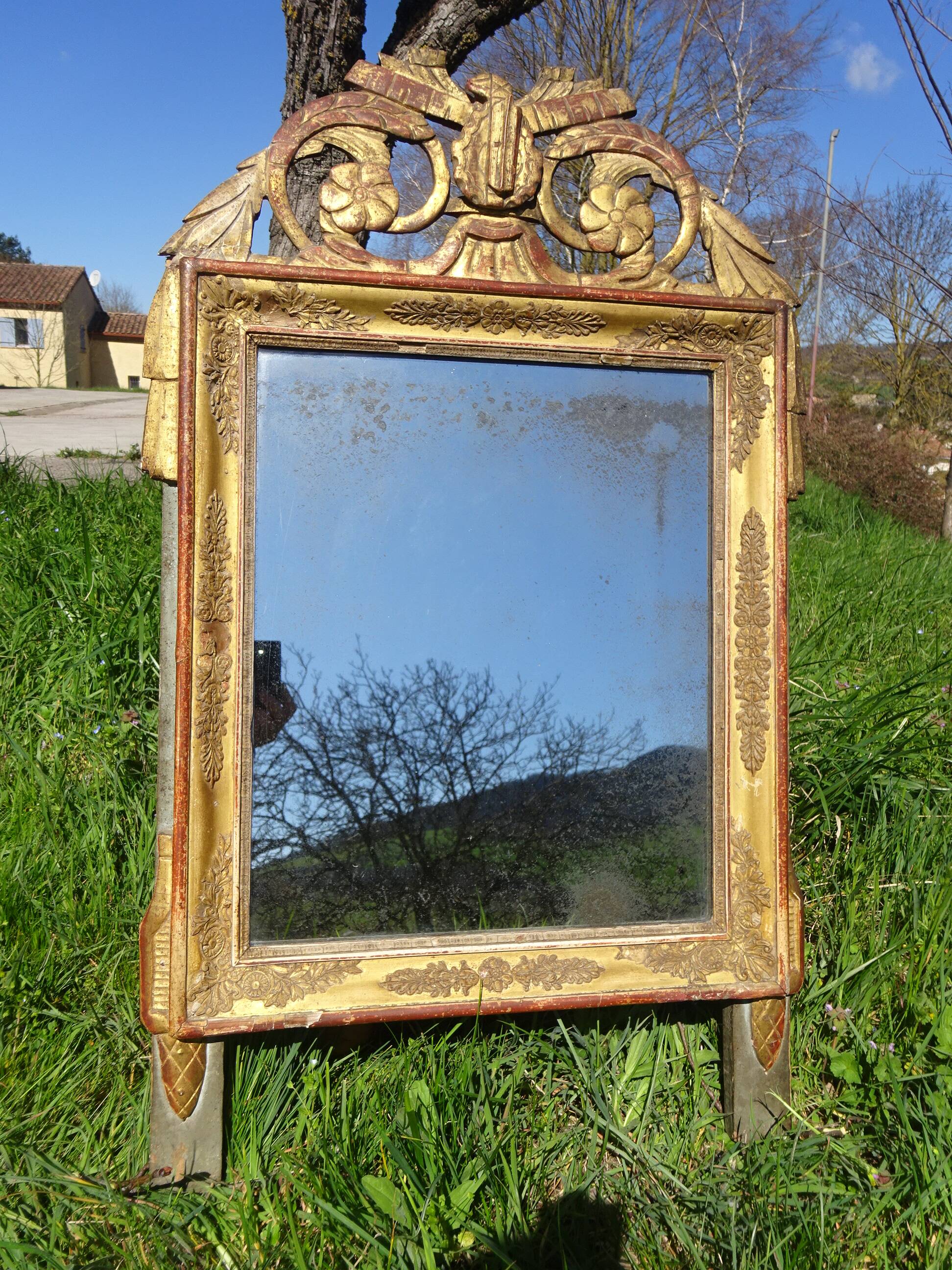 Very old Louis XVI style mirror.
