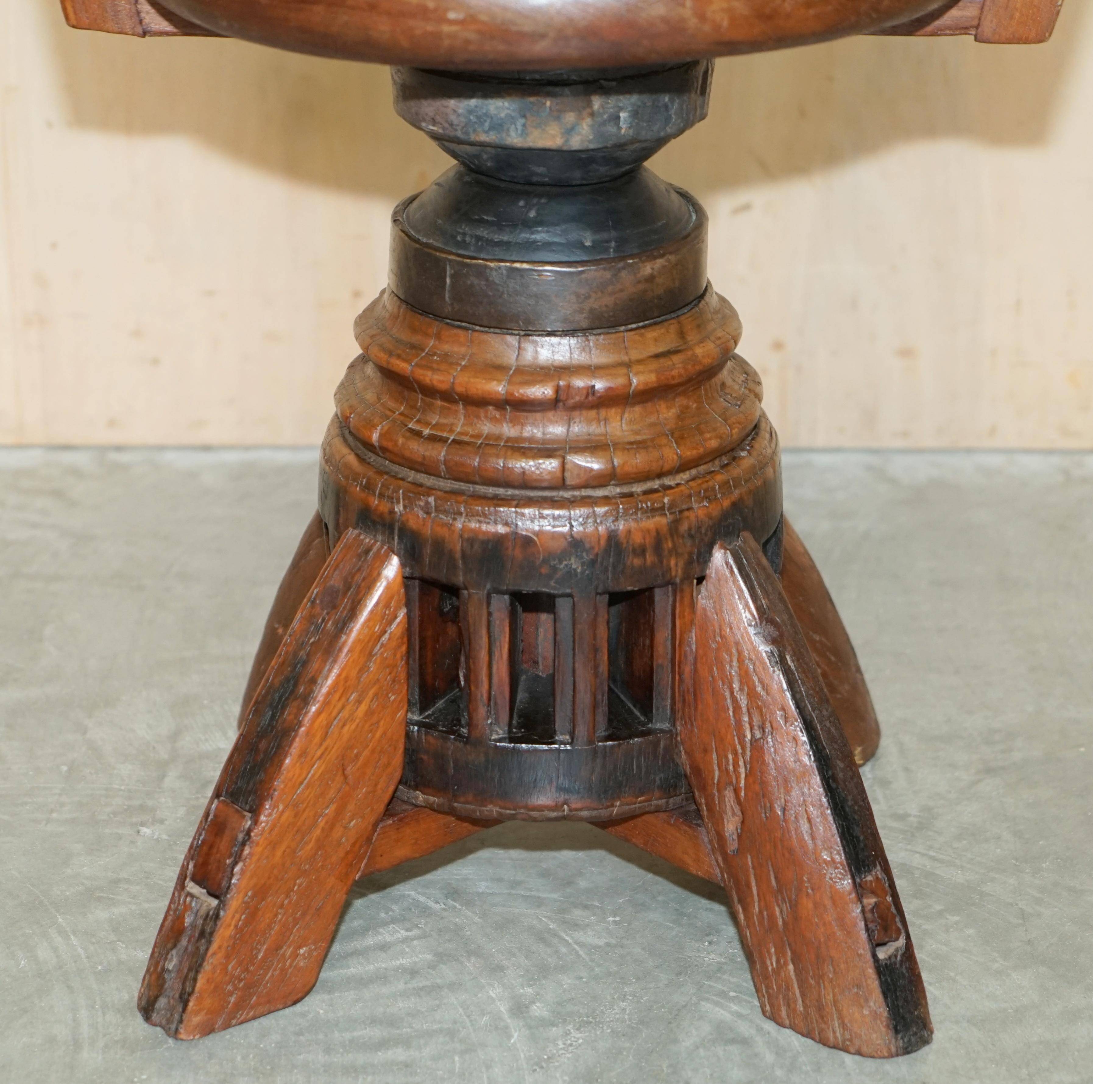 Antique captain's swivel chair on a draft horse wheel from around 1760.