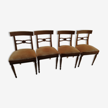 4 cherry wood chairs on top in orange velvet