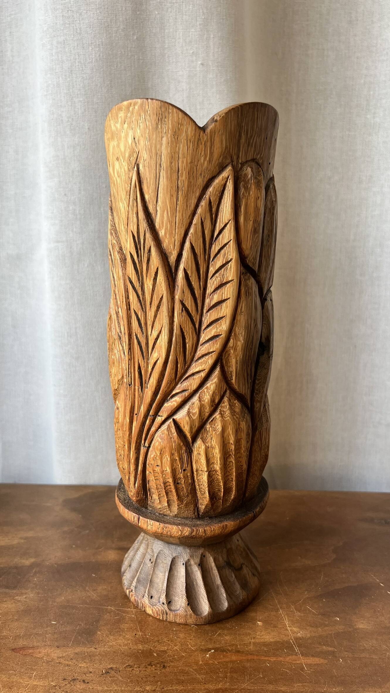 Large sculpted vase made of solid wood