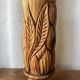Large sculpted vase made of solid wood