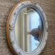 Vintage oval mirror in glazed earthenware