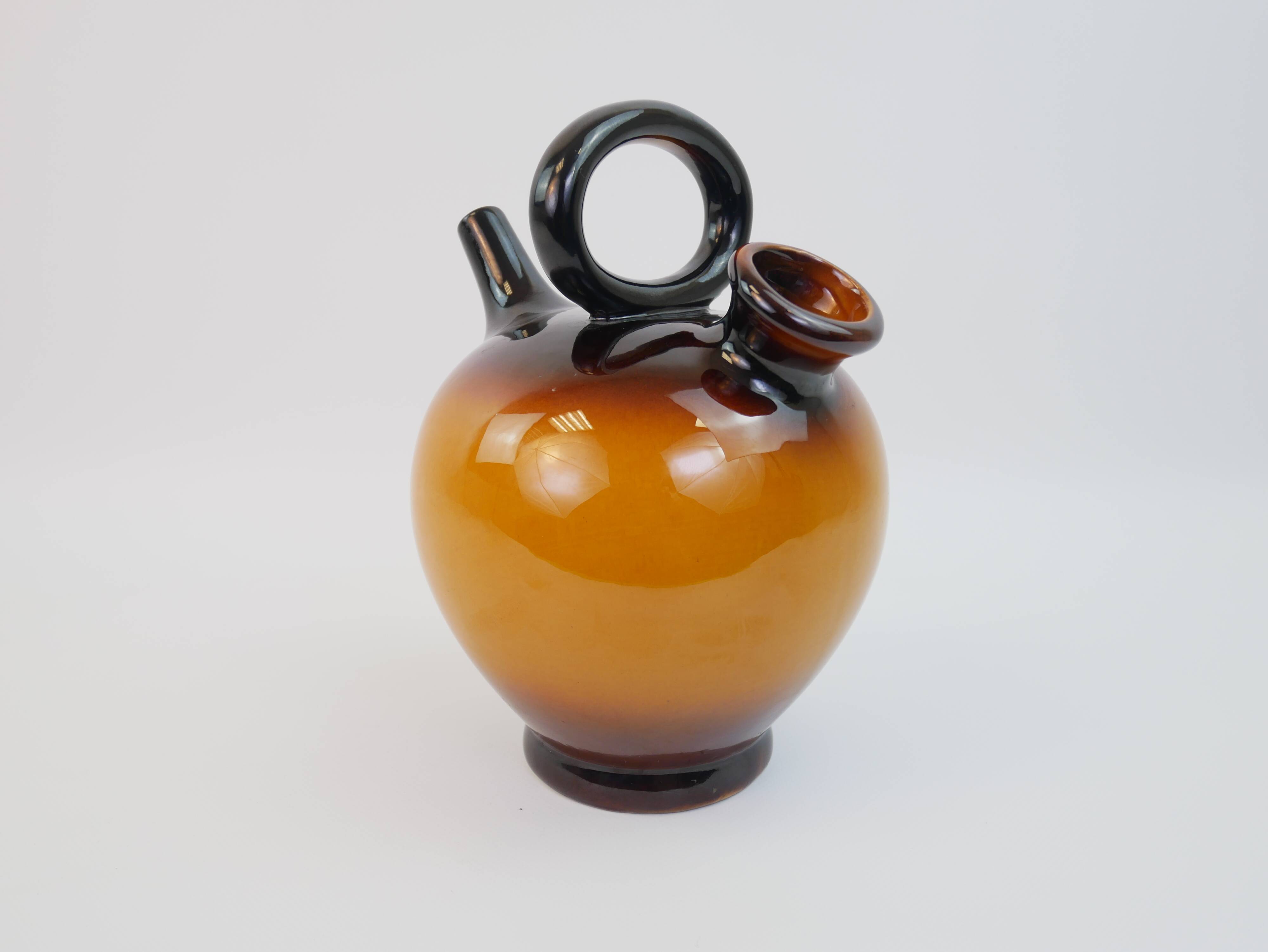 Ochre-orange ceramic jug signed under the base CP Claude Paci