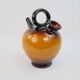 Ochre-orange ceramic jug signed under the base CP Claude Paci