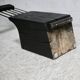Brutalist chair, black-stained raw wood, steel. Work from the 1970s