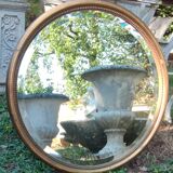 Old beveled round mirror