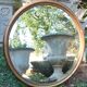 Old beveled round mirror