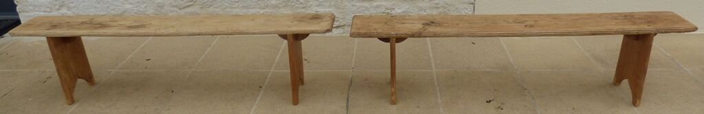 Two benches in their solid wood patinas