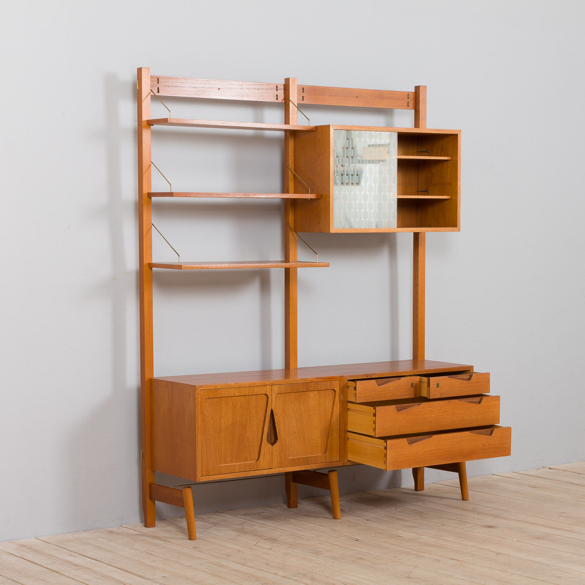 Rival 2 bay free standing teak wall unit with 3 cabinets and 3 shelves by Brodrene Jatogs Norway, Kj