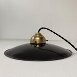 Old black enamelled industrial suspension