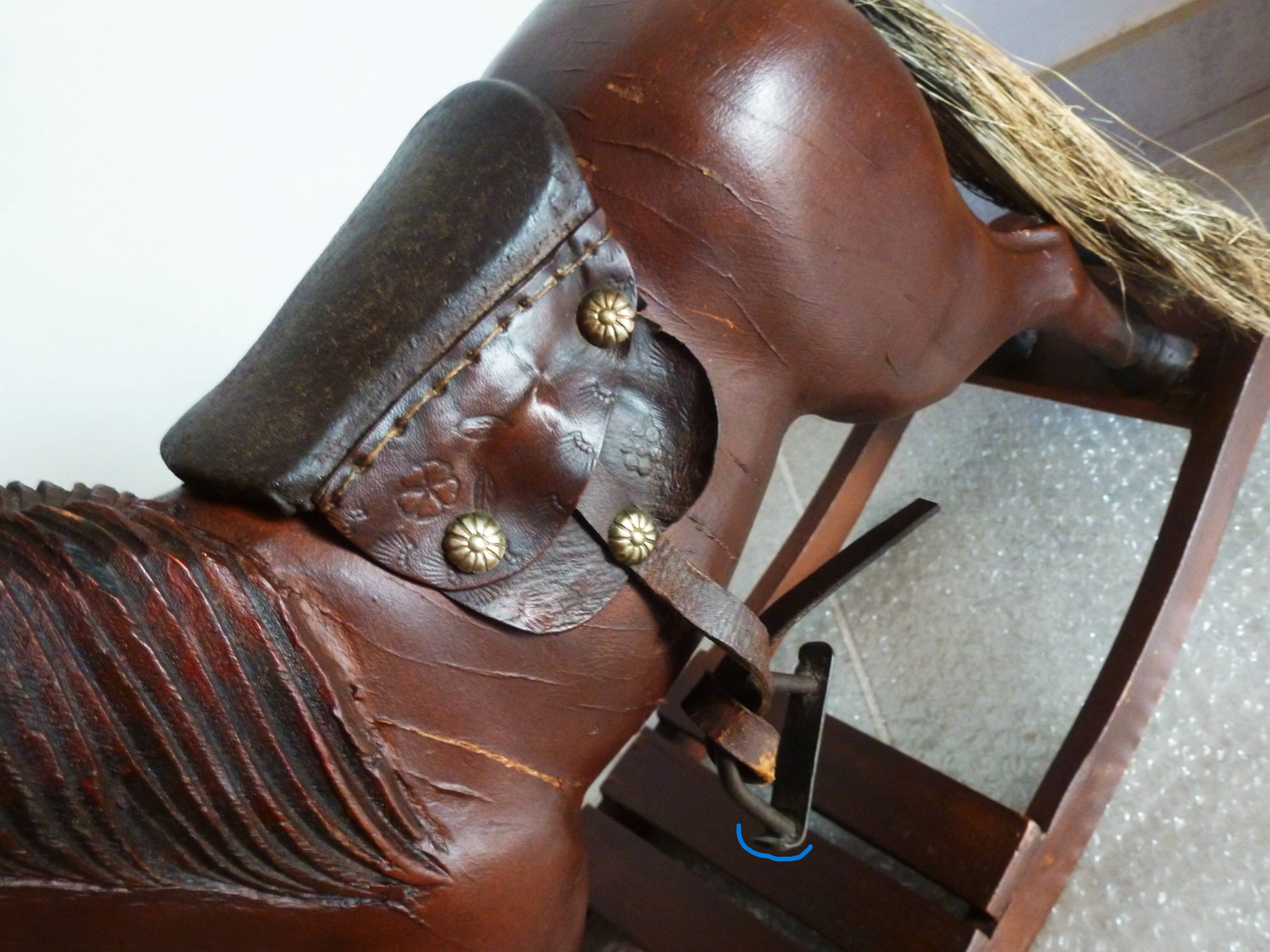 Antique wooden and leather rocking horse