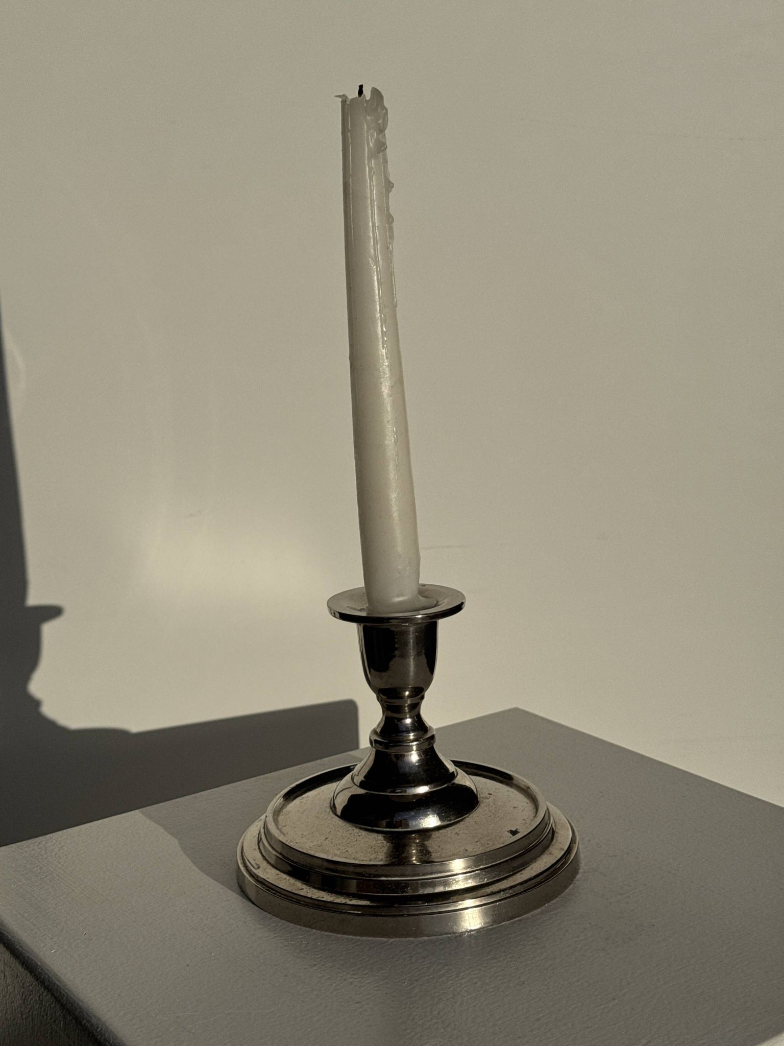 Small shiny silver-plated candlestick H11 D13