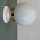 Vintage globe wall or ceiling light in white opaline.