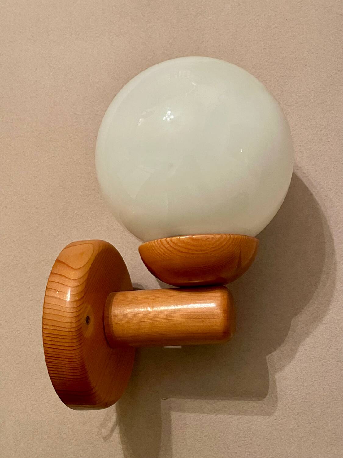 Vintage white glass wall light and pin.