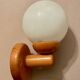 Vintage white glass wall light and pin.
