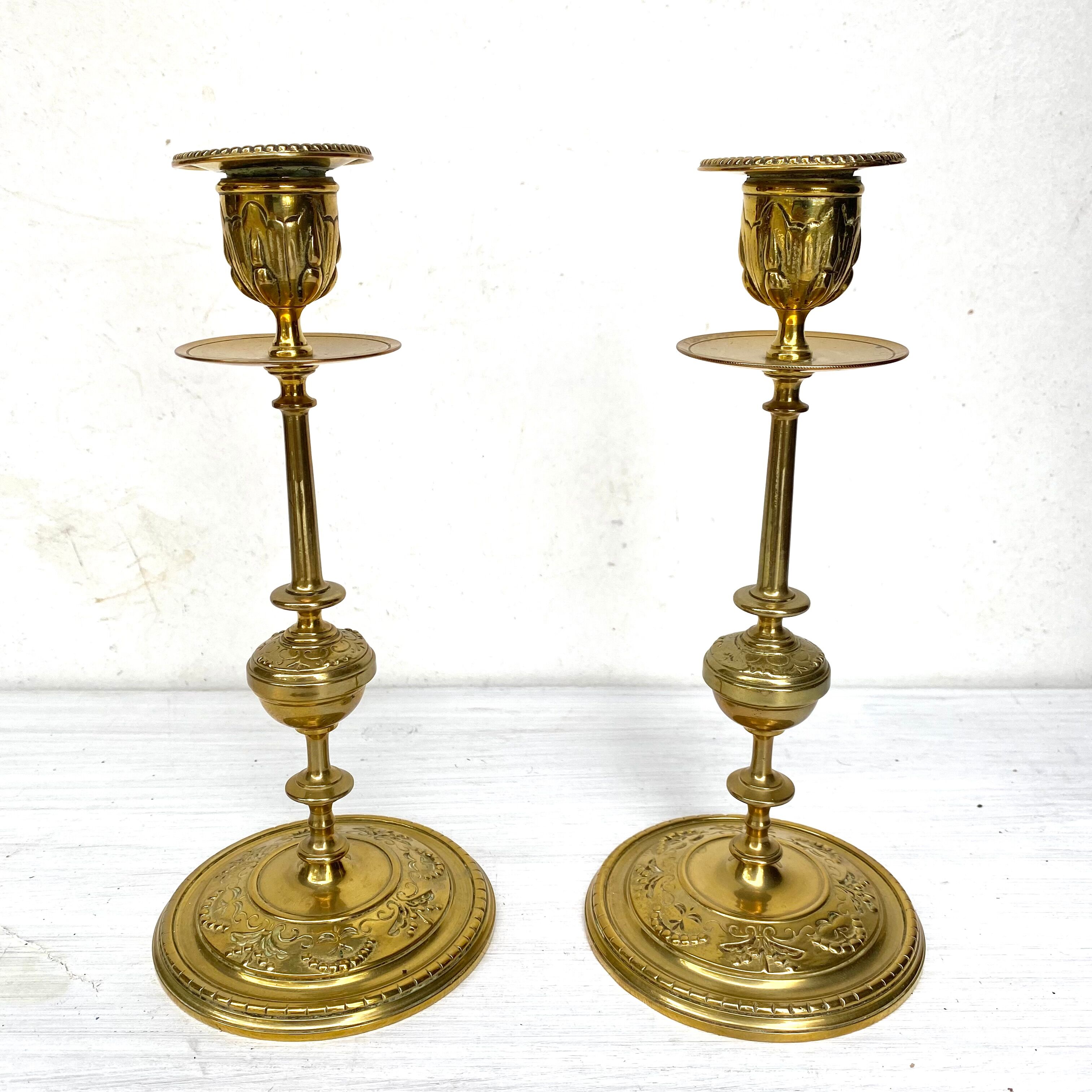 Golden brass candle holders