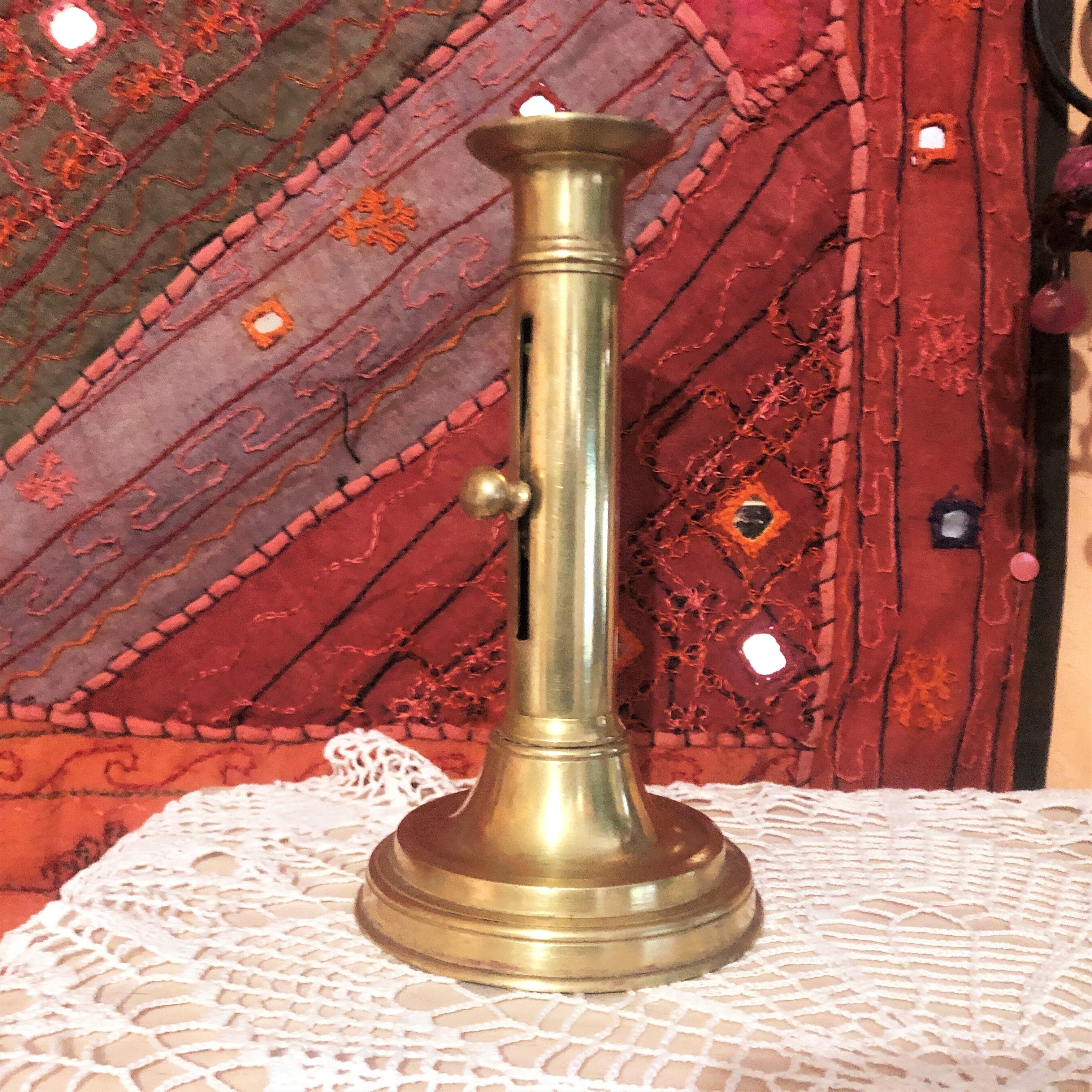 Old gold copper candle holder with pusher