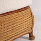 Large wicker armchair and its ottoman