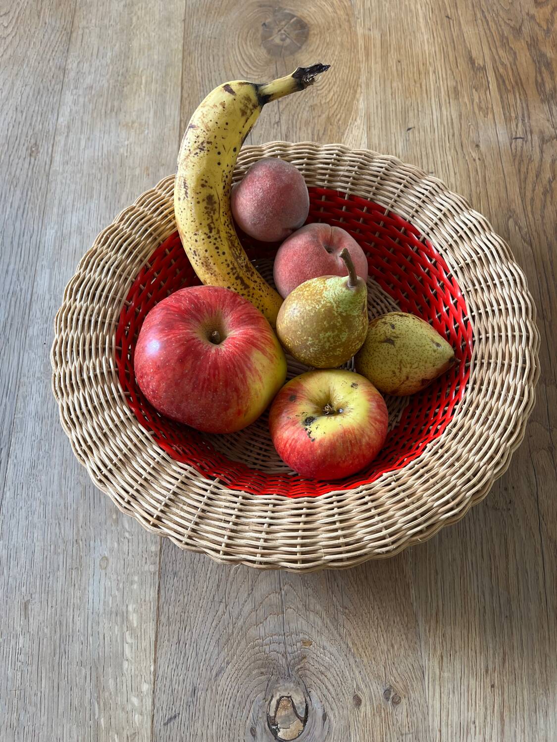 Rattan basket with red trim
