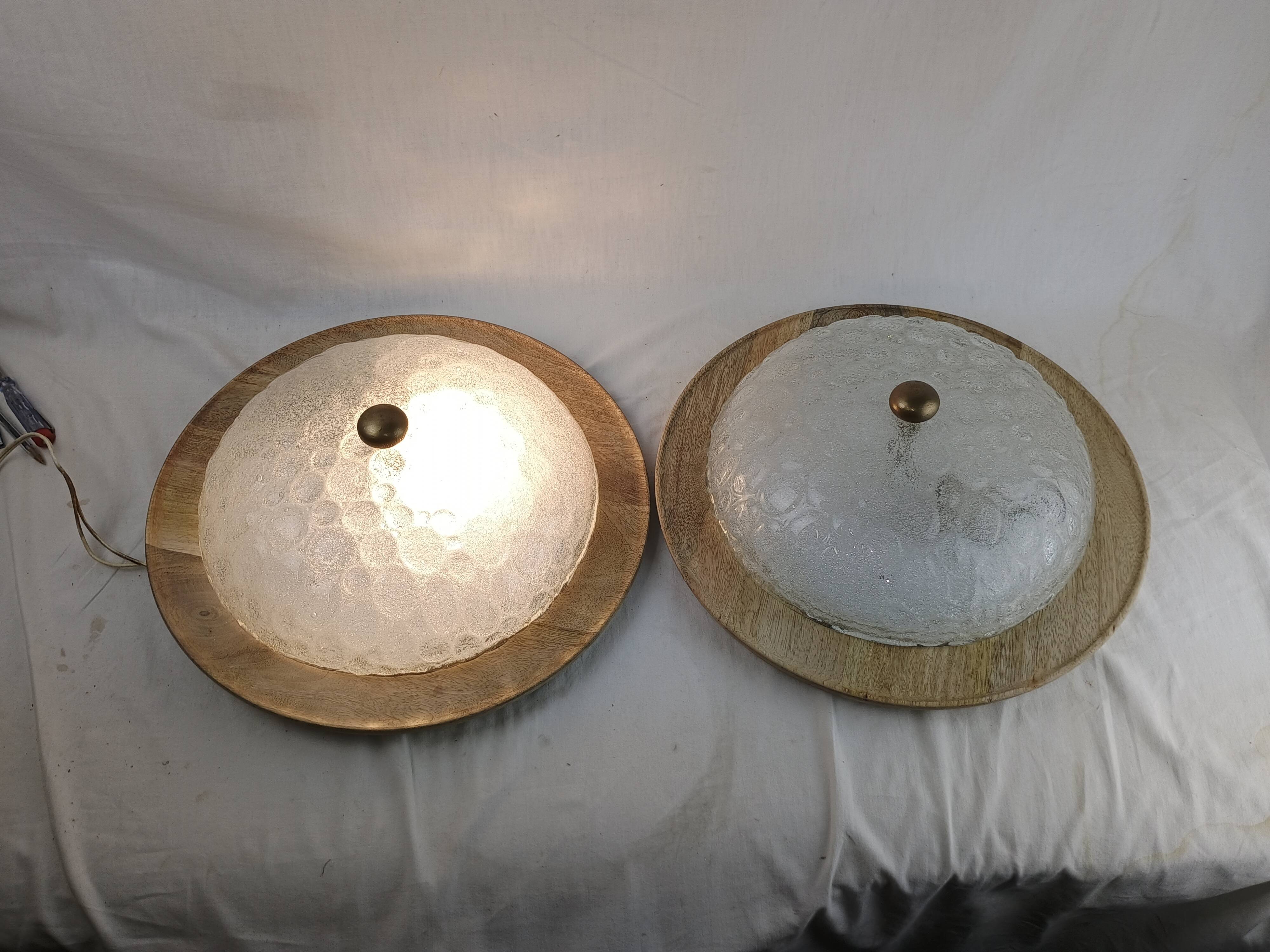 Pair of vintage Murano wall lights with exotic wood shelf.