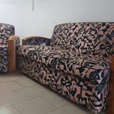 Convertible sofa and art deco armchair in lelievre fabrics.