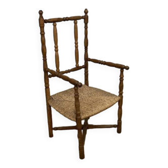 Straw and turned wood armchair