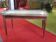 Table basse style louis XVI en acajou et laiton
