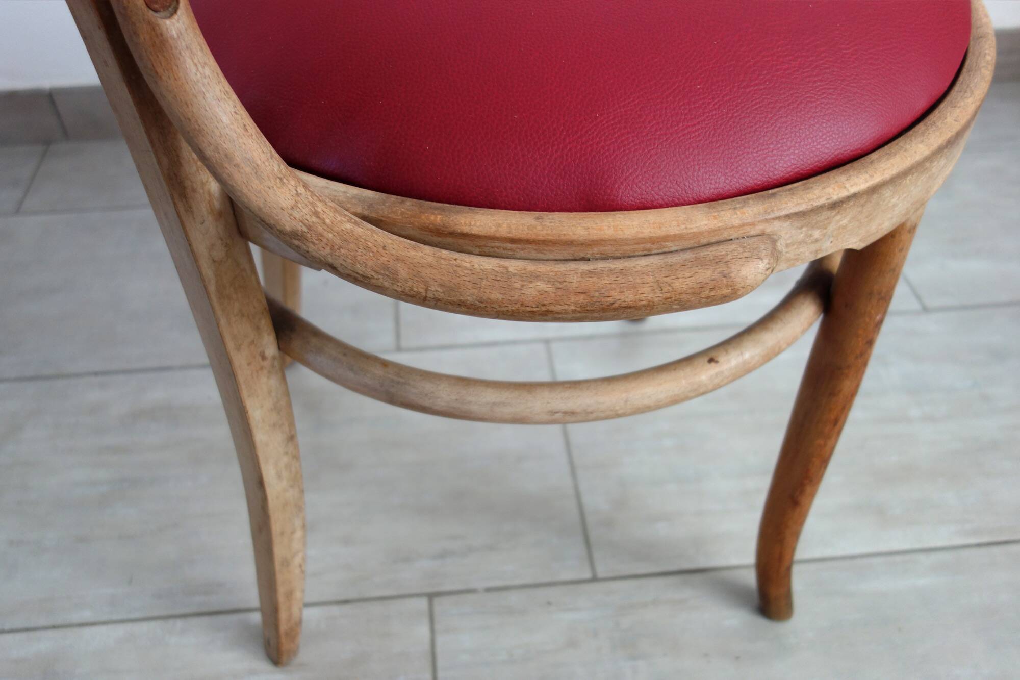 Vintage curved wooden armchair