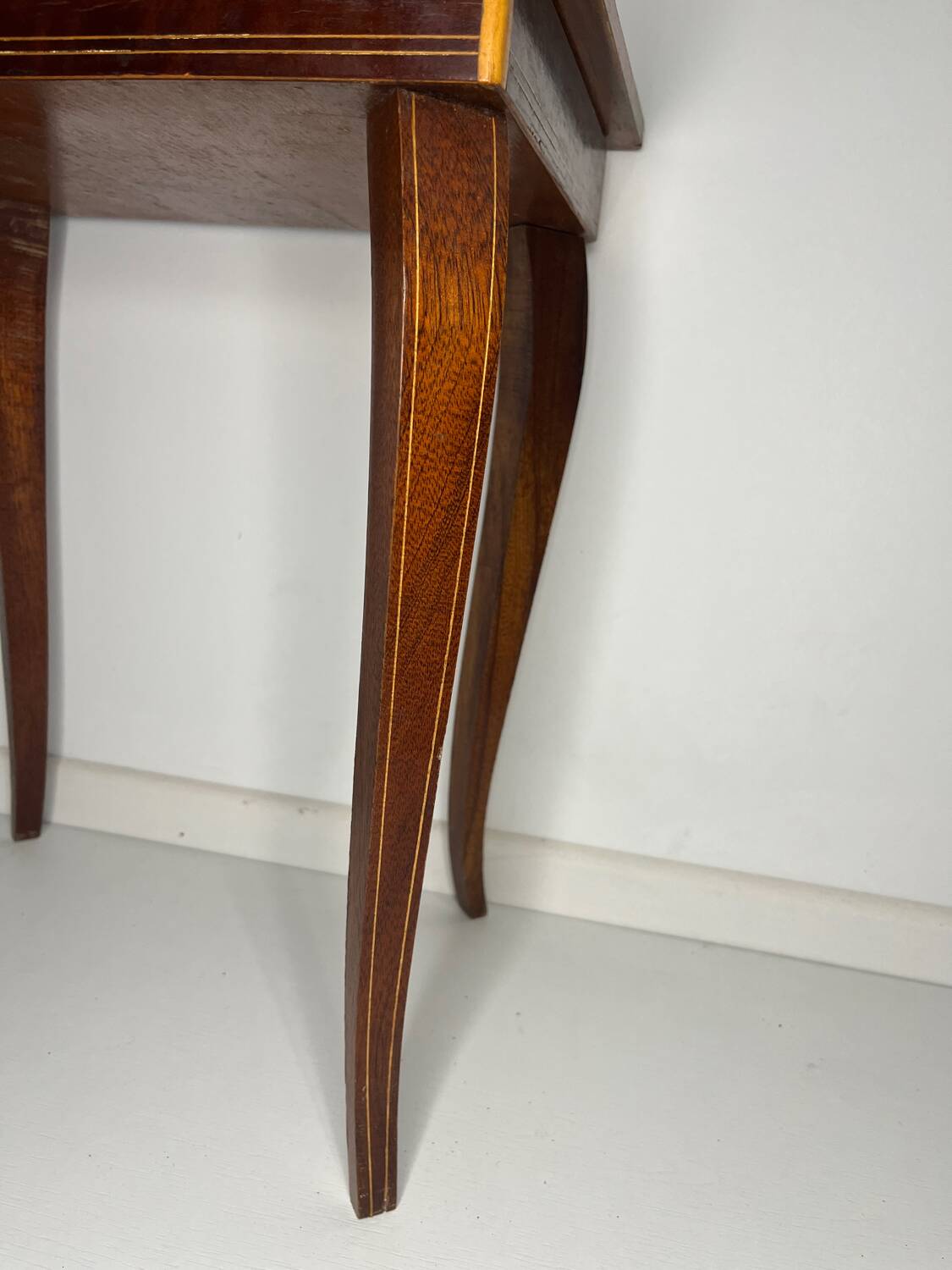 Small antique Italian inlaid table with Swiss music box.