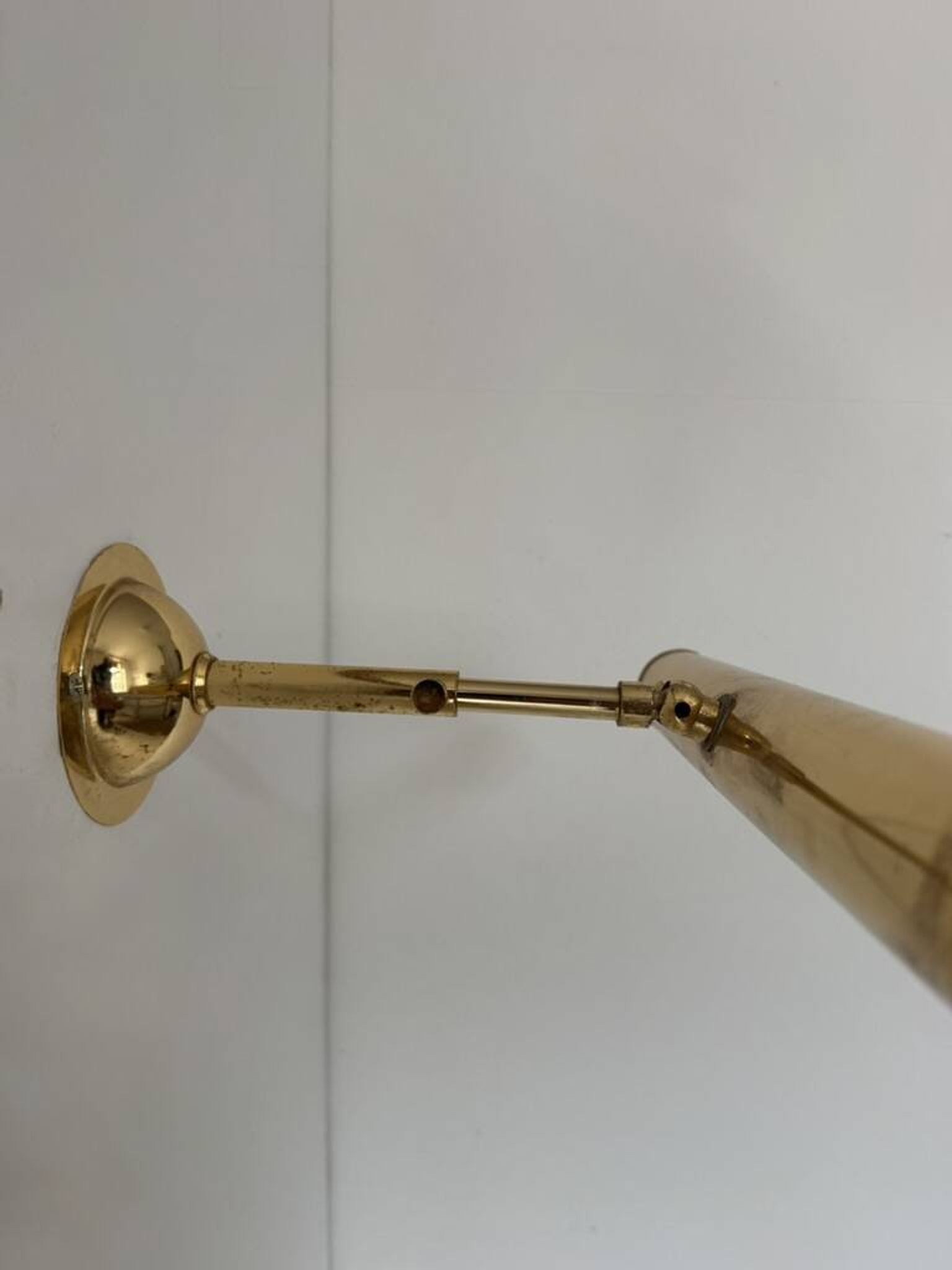 Pair of adjustable vintage brass wall lights, France, 1970.