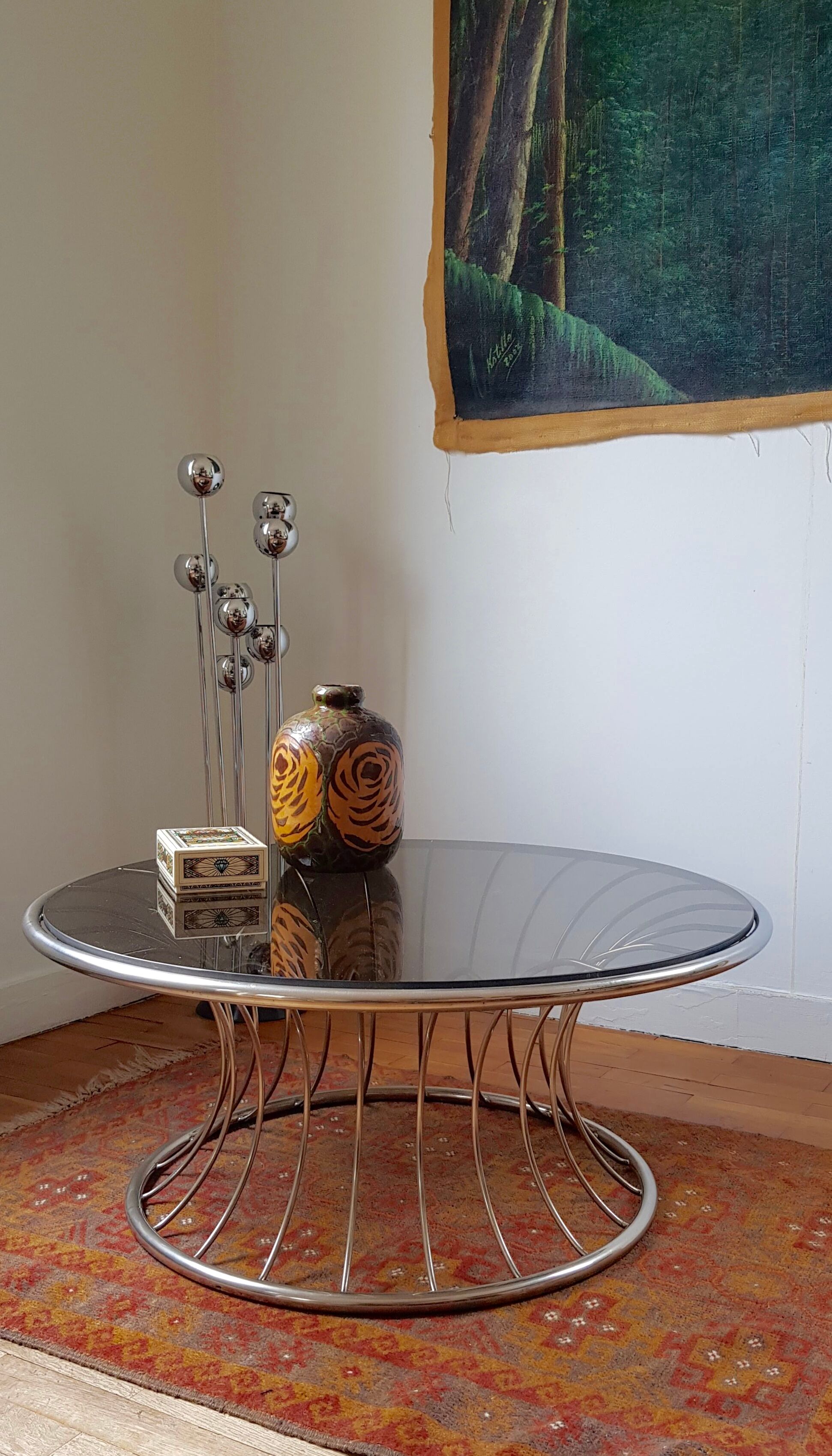 Chromium round coffee table and smoked glass