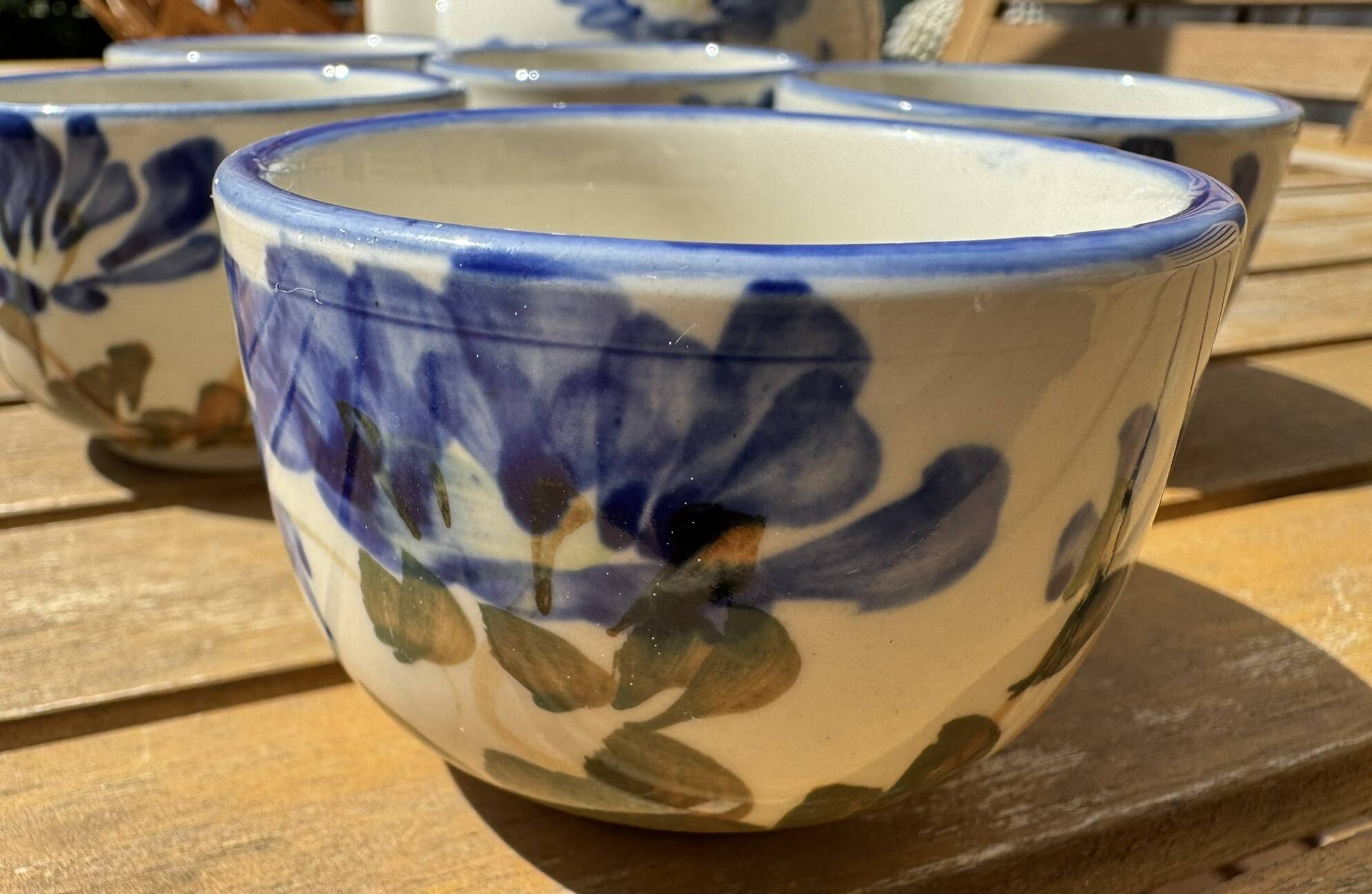 Vintage ceramic tea set for 6 bowls and a teapot.