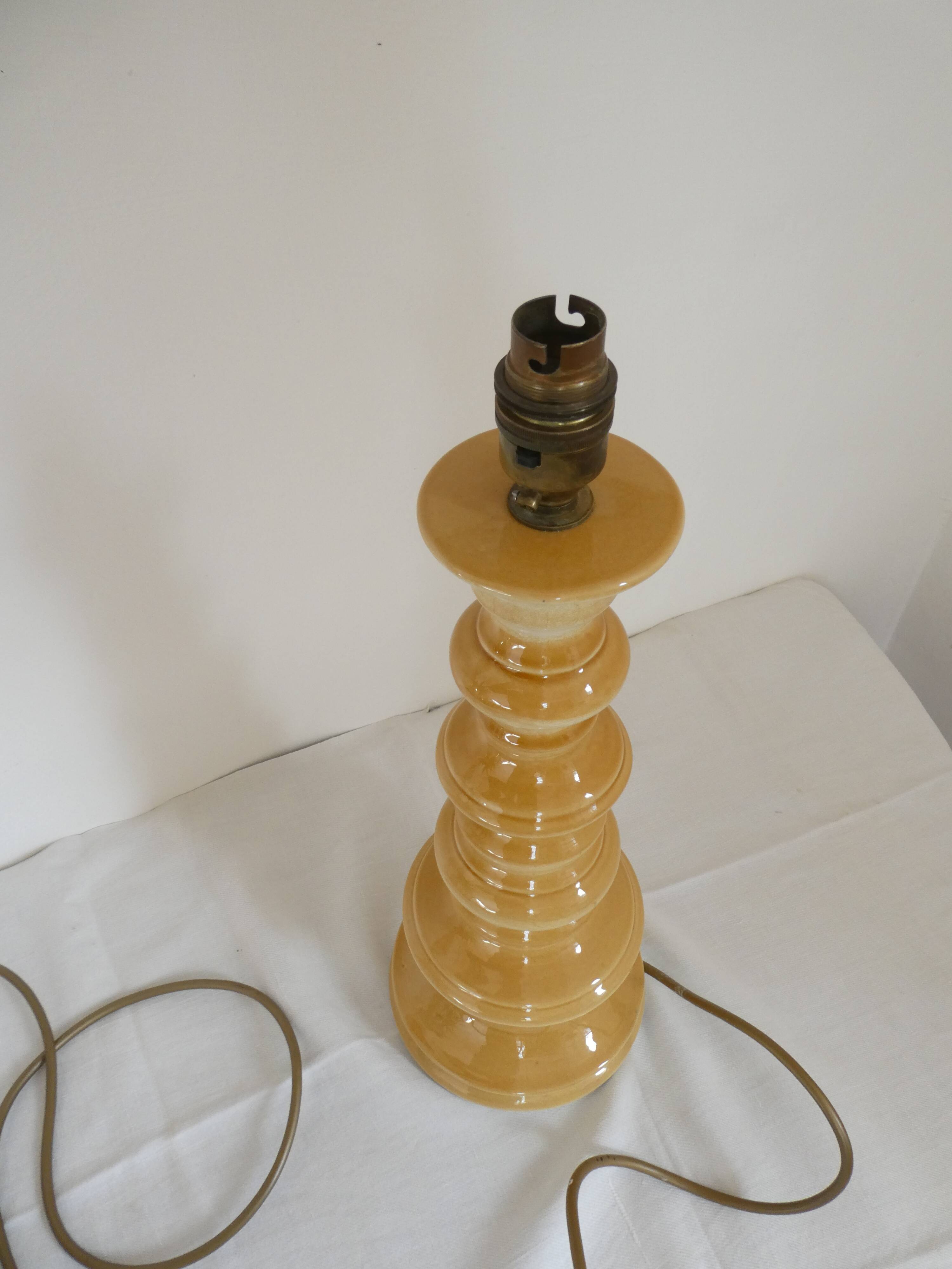 Large baluster-shaped lamp base in yellow and beige ceramic from the 1960s.