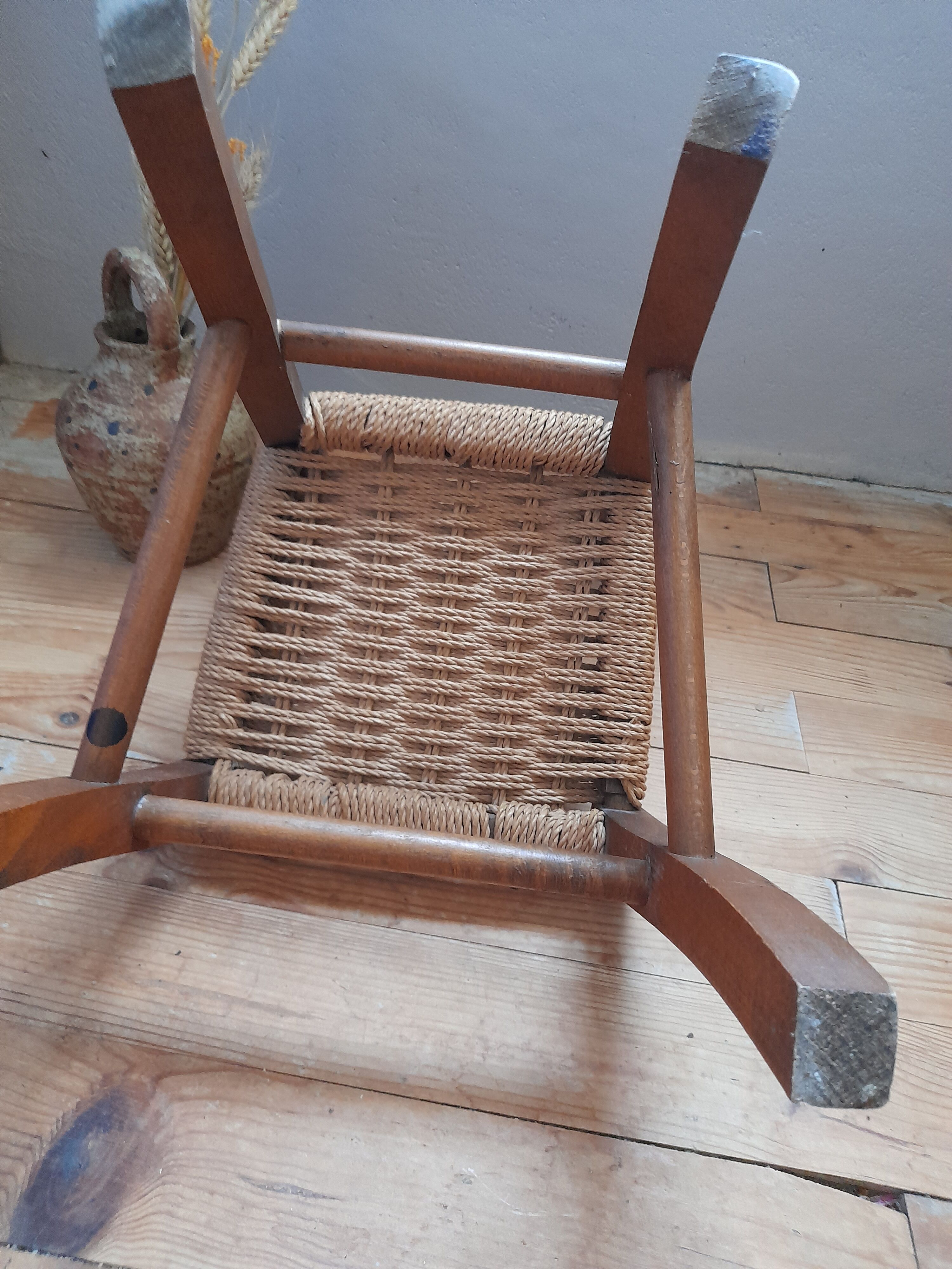 Wooden children's chair, rope seat, circa 1950
