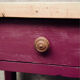 Wood and aubergine bedside table