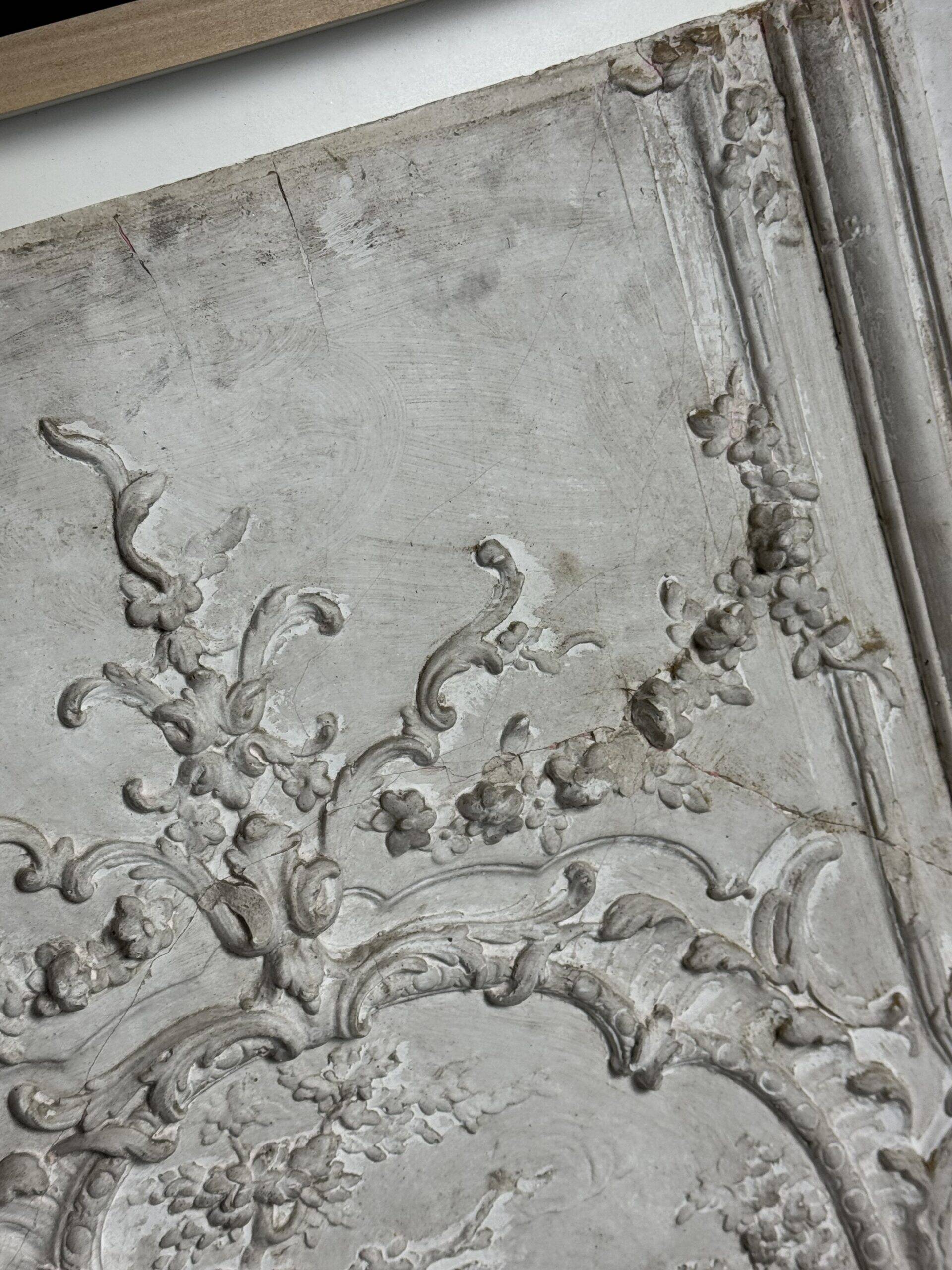 Plaster ceiling fragment framed