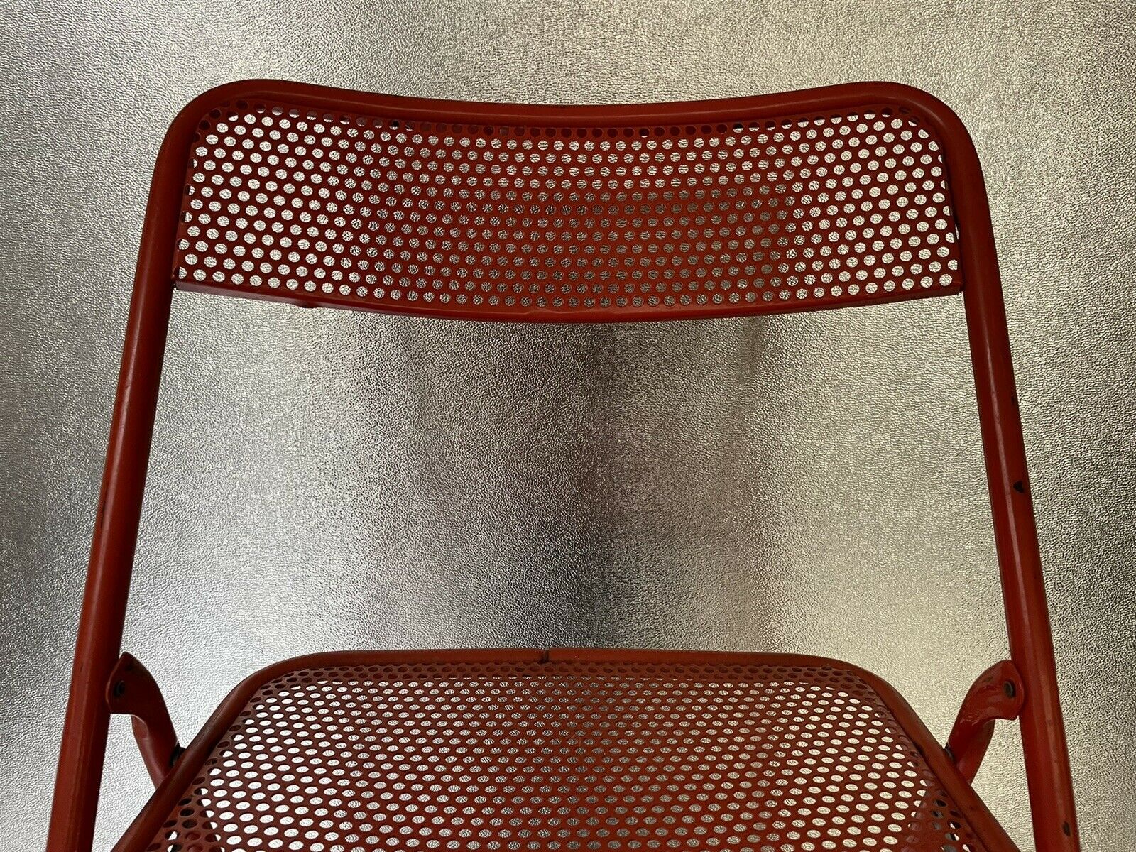 Old folding chair metal perforated red 60s, 70s, vintage