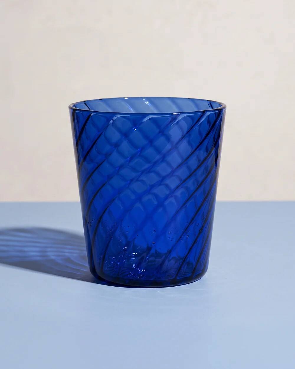 Handmade blue swirled glass tumbler