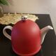 Porcelain teapot with thermal lid