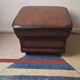 Vintage ottoman / pouffe in chestnut brown leather